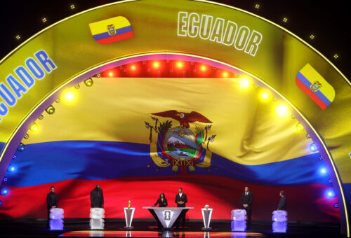 WASHINGTON, DC - DECEMBER 05: Draw assistant Tom Brady, Draw assistant Shaquille O’Neal, Co-Conductor Samantha Johnson, FIFA Legend Rio Ferdinand, Draw assistant Aaron Judge and Draw assistant Wayne Gretzky stand on stage as Ecuador is illuminated on the screen during the FIFA World Cup 2026 Official Draw at John F. Kennedy Center for the Performing Arts on December 05, 2025 in Washington, DC. (Photo by Hector Vivas - FIFA/FIFA via Getty Images)